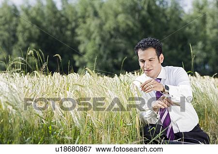 Stock Photo - businessman feeling spike. Fotosearch