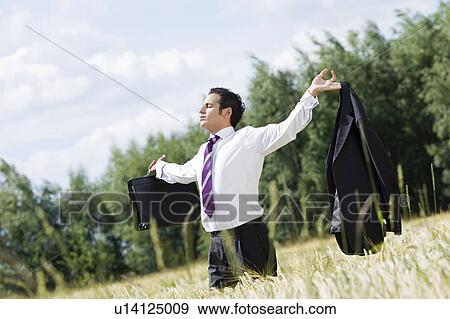 businessman in cornfield View Large Photo Image Stock Photo - businessman in cornfield. Fotosearch