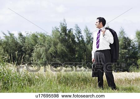 businessman in cornfield View Large Photo Image Stock Photo - businessman in cornfield. Fotosearch
