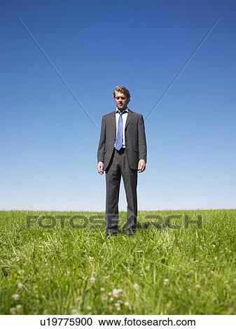 businessman in field View Large Photo Image Stock Image - businessman in field. Fotosearch