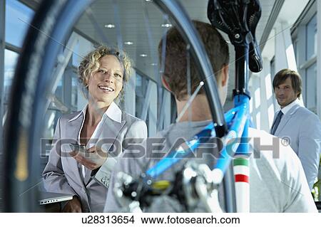 Picture - businessman with computer. Fotosearch