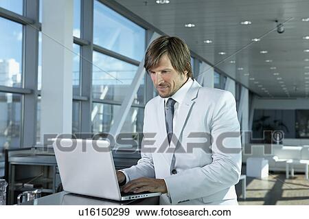 businessman with computer View Large Photo Image Stock Photo - businessman with computer. Fotosearch
