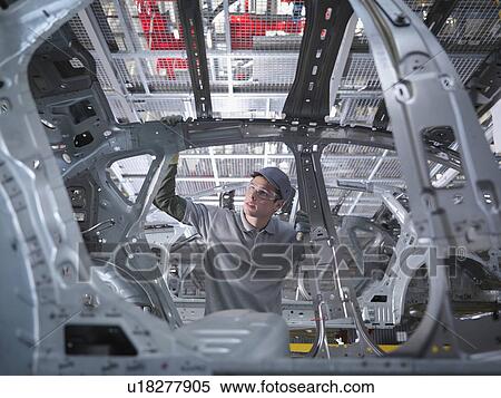 Car Plant Worker Inspecting Car View Large Photo Image Stock Photography - Car Plant Worker Inspecting Car. Fotosearch