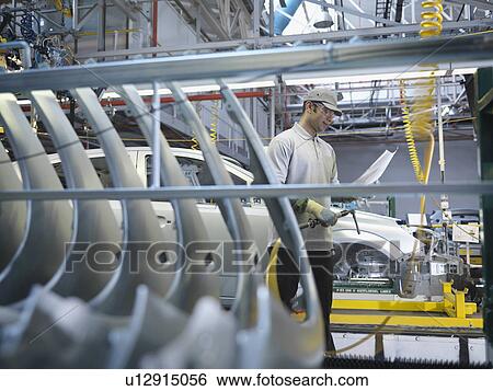 Car Plant Worker On Production Line View Large Photo Image Stock Photograph - Car Plant Worker On Production Line. Fotosearch