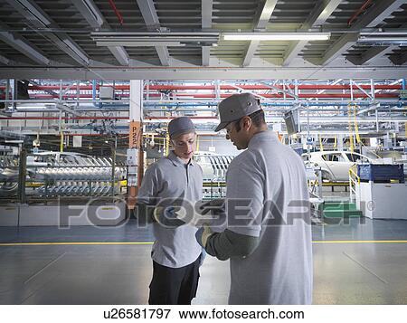 Car Plant Workers In Factory View Large Photo Image Stock Photo - Car Plant Workers In Factory. Fotosearch