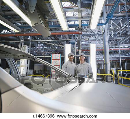 Car Plant Workers On Production Line View Large Photo Image Stock Photograph - Car Plant Workers On Production Line. Fotosearch