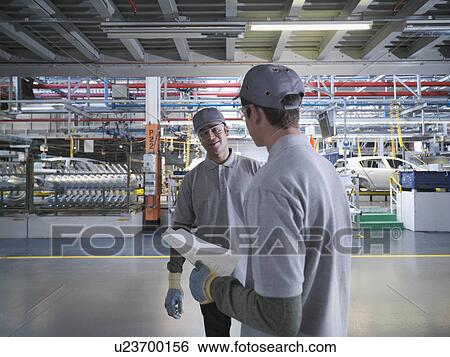Car Plant Workers Talking In Factory View Large Photo Image Stock Photograph - Car Plant Workers Talking In Factory. Fotosearch