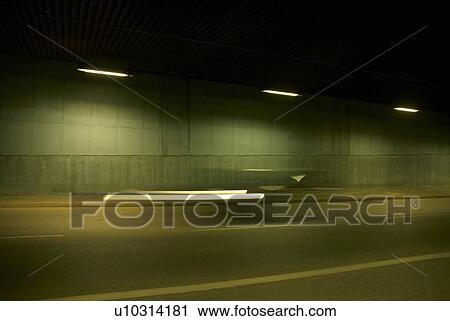 car streaking past in tunnel View Large Photo Image Stock Image - car streaking past in tunnel. Fotosearch