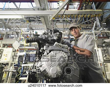 Car Worker Building Car Parts View Large Photo Image Stock Photo - Car Worker Building Car Parts. Fotosearch