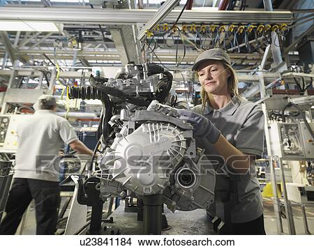 Car Workers Building Car Parts View Large Photo Image Picture - Car Workers Building Car Parts. Fotosearch