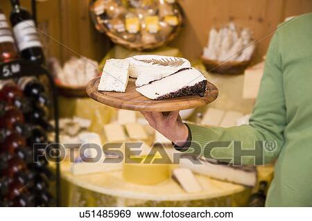cheese, wine store owner in shop View Large Photo Image Stock Photo - cheese, wine store owner in shop. Fotosearch