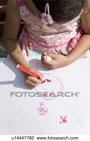 Stock Image - Child drawing. Fotosearch