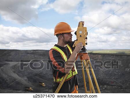 Coal Miner With Surveying Equipment View Large Photo Image Stock Image - Coal Miner With Surveying Equipment. Fotosearch