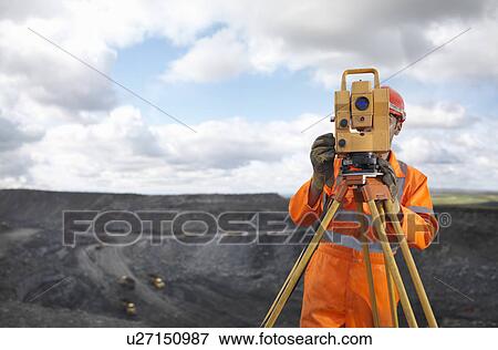 Coal Miner With Surveying Equipment View Large Photo Image Stock Photo - Coal Miner With Surveying Equipment. Fotosearch