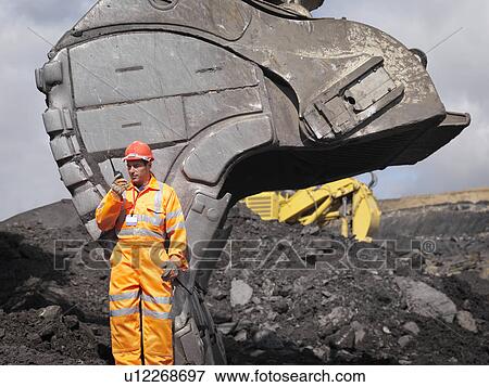 Coal Miner With Walkie Talkie View Large Photo Image Stock Photo - Coal Miner With Walkie Talkie. Fotosearch