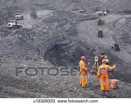 Coal Miners Surveying Mine From Above View Large Photo Image Stock Image - Coal Miners Surveying Mine From Above. Fotosearch