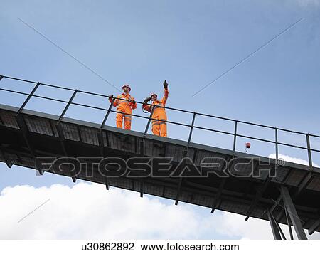 Stock Image - Coal Workers On Viewing Platform. Fotosearch