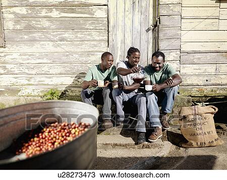 Stock Image - Coffee Workers Drinking Cups Of Coffee. Fotosearch