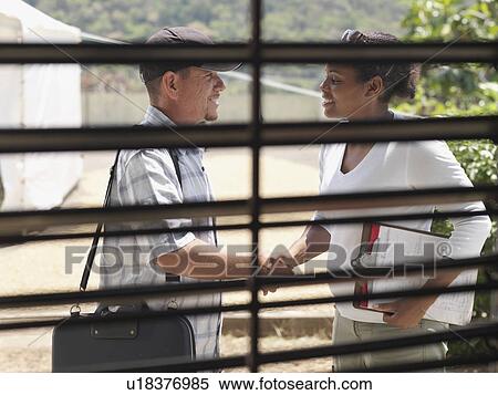Stock Photography - Colleagues Shaking Hands. Fotosearch