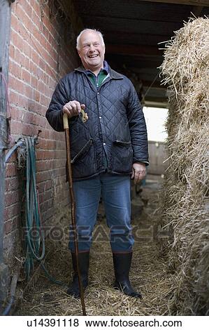 Content farmer laughing View Large Photo Image Stock Photo - Content farmer laughing. Fotosearch