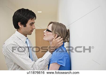 couple embracing in corridor View Large Photo Image Stock Photograph - couple embracing in corridor. Fotosearch