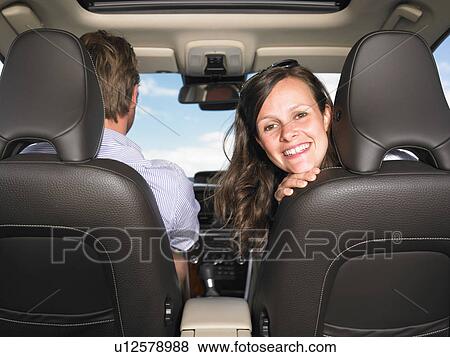 Stock Photo - couple in car. Fotosearch
