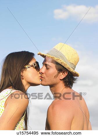 Stock Photography - couple kissing. Fotosearch