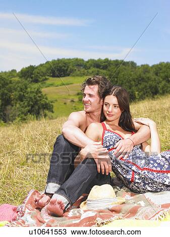 couple on blanket in field View Large Photo Image Stock Image - couple on blanket in field. Fotosearch