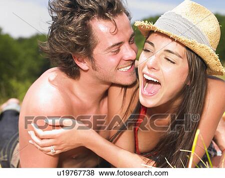 couple on blanket in field View Large Photo Image Stock Photo - couple on blanket in field. Fotosearch