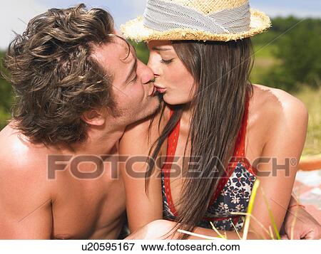 couple on blanket in field View Large Photo Image Stock Photo - couple on blanket in field. Fotosearch