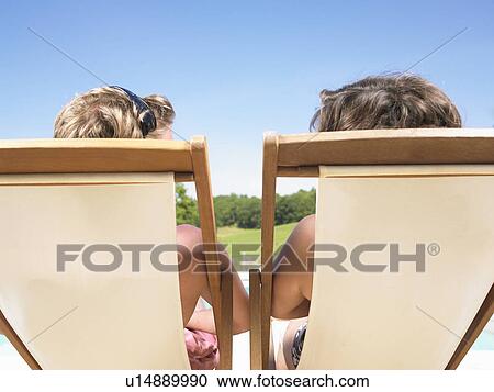 couple on deckchairs View Large Photo Image Stock Image - couple on deckchairs. Fotosearch