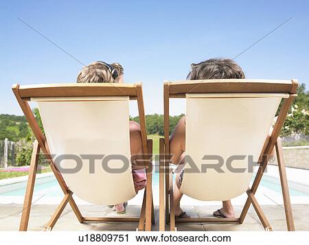 couple on deckchairs View Large Photo Image Stock Image - couple on deckchairs. Fotosearch