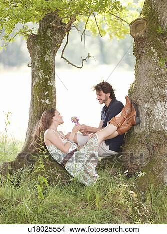 couple under trees View Large Photo Image Picture - couple under trees. Fotosearch