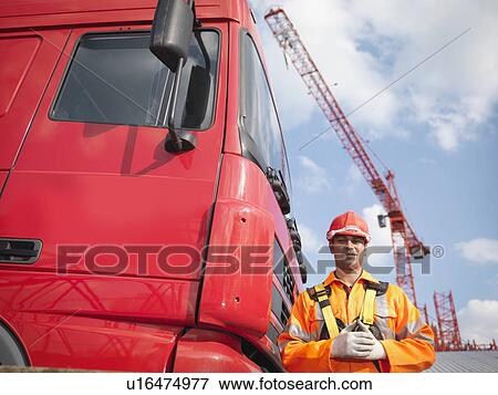 Crane Worker Next To Lorry View Large Photo Image Stock Photo - Crane Worker Next To Lorry. Fotosearch