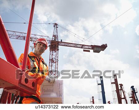 Crane Worker With Notes View Large Photo Image Stock Image - Crane Worker With Notes. Fotosearch
