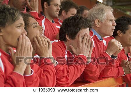 Stock Image - Despairing fans at football match. Fotosearch