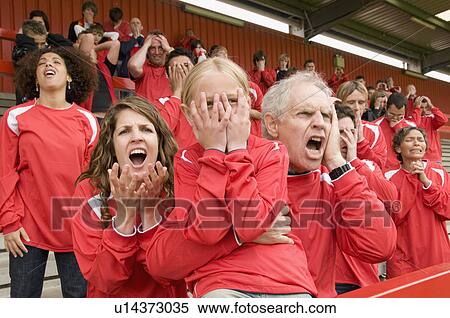 Stock Photography - Despairing Fans at football match. Fotosearch
