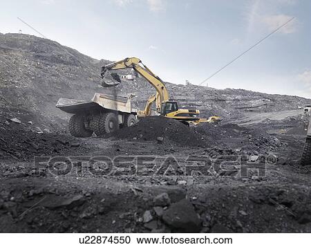 Digger Working In Coal Mine View Large Photo Image Stock Image - Digger Working In Coal Mine. Fotosearch