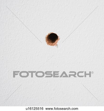 drilled hole in wall View Large Photo Image Stock Photograph - drilled hole in wall. Fotosearch