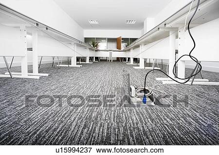 Stock Photo - empty presentation room with cables. Fotosearch