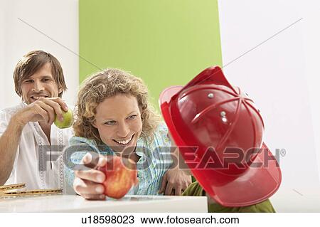 Stock Image - family having a healthy diet. Fotosearch