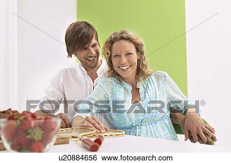 Stock Photograph - family having a healthy diet. Fotosearch