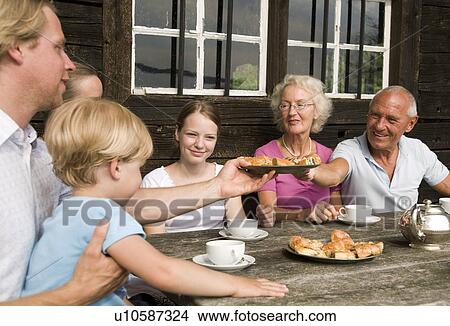 Picture - family of three generations. Fotosearch