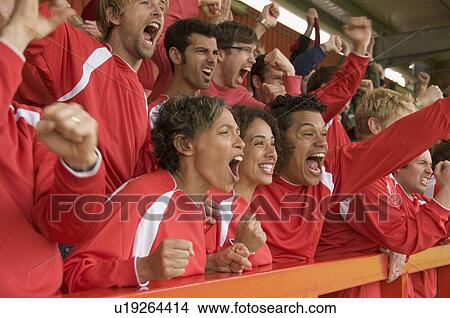 Fans celebrating at football match View Large Photo Image Picture - Fans celebrating at football match. Fotosearch