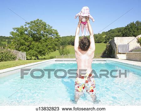 father and baby in pool View Large Photo Image Stock Image - father and baby in pool. Fotosearch