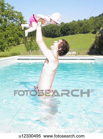 father and baby in pool View Large Photo Image Stock Photography - father and baby in pool. Fotosearch