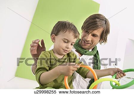 Stock Photography - father and son. Fotosearch