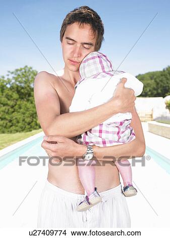 father holding baby View Large Photo Image Picture - father holding baby. Fotosearch