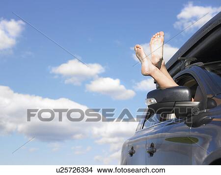 feet out of car window View Large Photo Image Picture - feet out of car window. Fotosearch