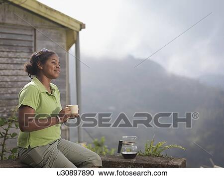 Female Coffee Worker Drinking Coffee View Large Photo Image Stock Image - Female Coffee Worker Drinking Coffee. Fotosearch